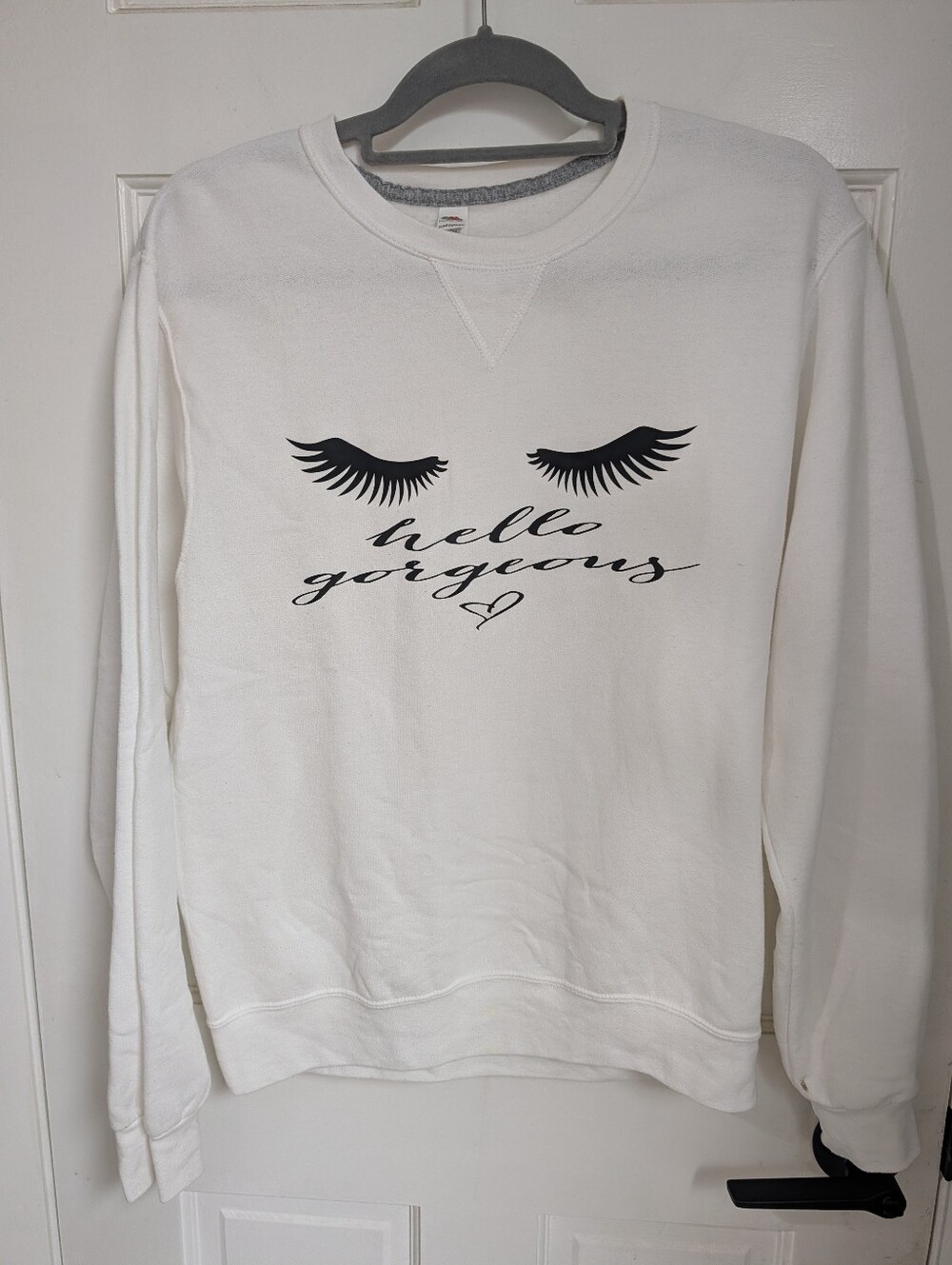 Fruit of the Loom White Sweatshirt with Black Eyelash Graphic